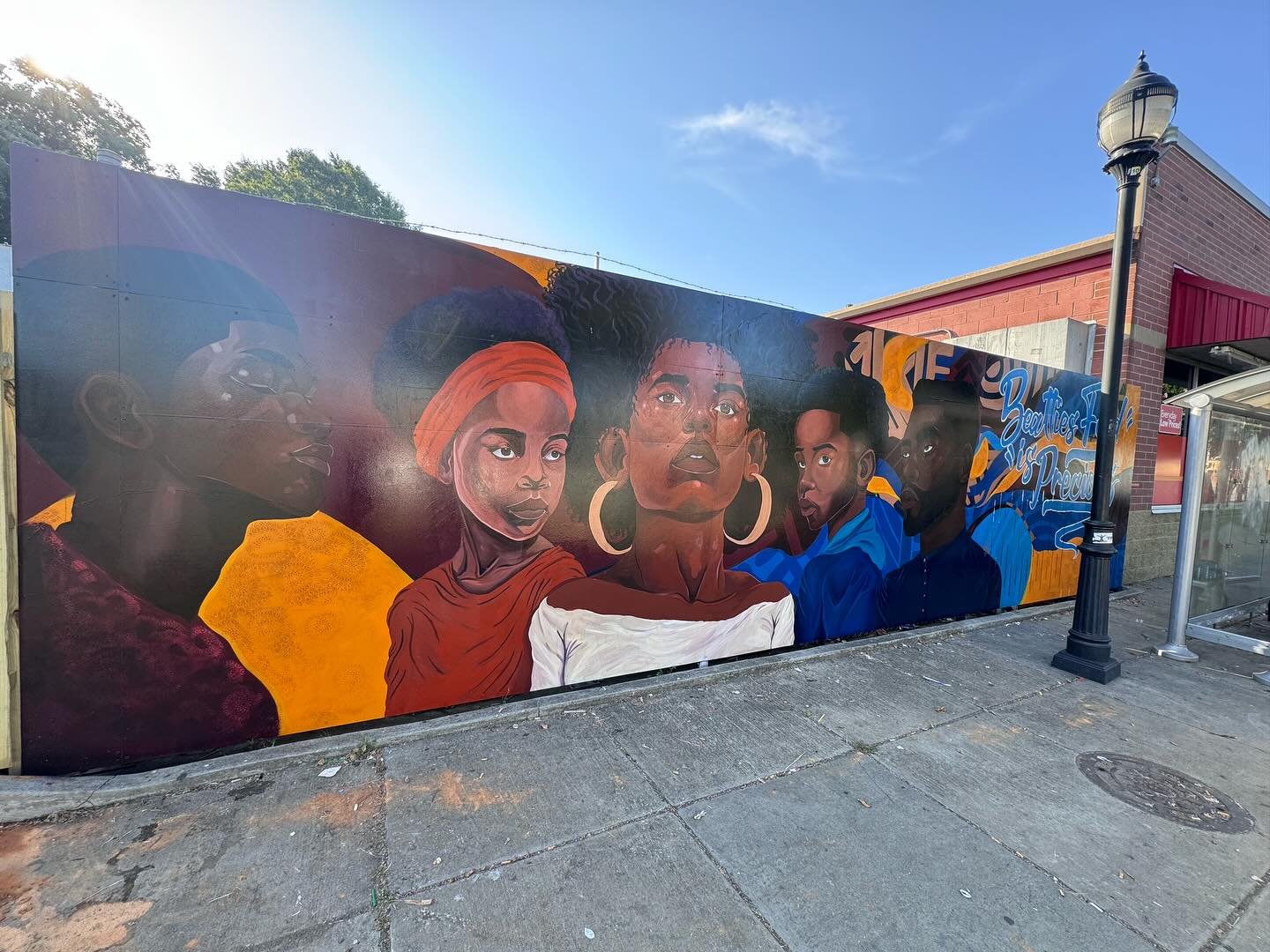 A new mural on Beatties Ford Road, completed in 2024 as part of the Corridors to Opportunity projects. (Source: Charlotte Urban Design Center / facebook.com)