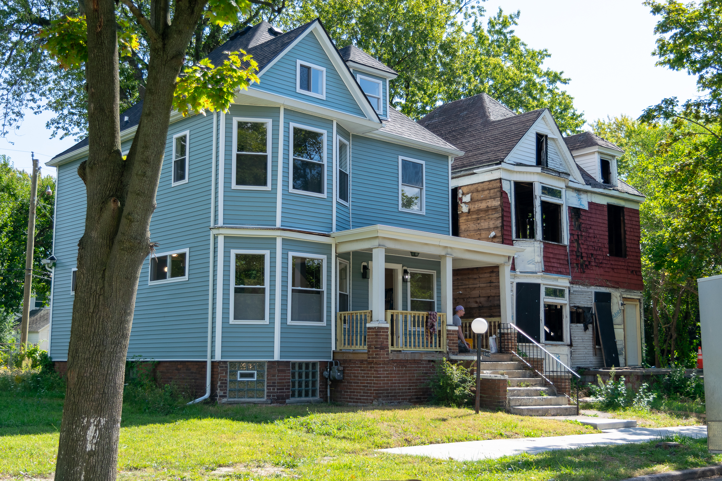 vacant house next to not vacant house