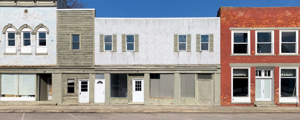 Abandoned vacant building and stores in Milford Center Ohio. Photo: Adobe Stock / Michael Carni