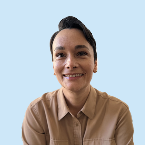 Headshot of Carolina Rodriguez on a blue background