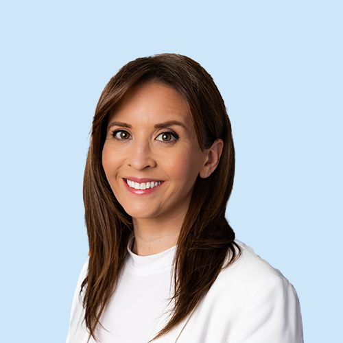 Headshot of Danielle Lewinksi on a blue background
